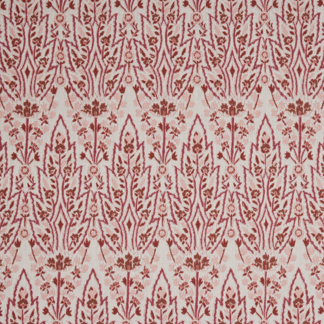 A red and white floral pattern on a white background inspired by Mughal gardens, featuring the Marmar Berry Performance Fabric by John Robshaw.