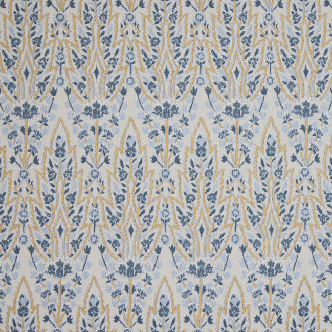 A blue and yellow floral pattern on a white background inspired by the Mughal gardens of Shalimar Bagh, featuring the Marmar Marigold Performance Fabric by John Robshaw.