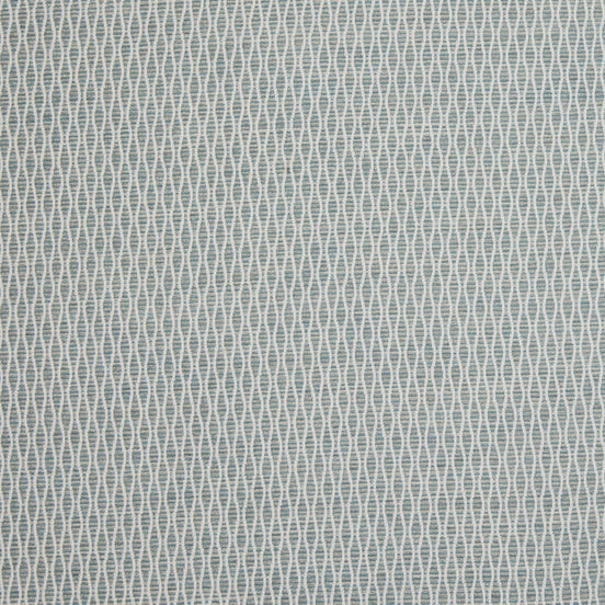 A blue and white woven rug with a geometric pattern made from Natesh Mist Performance Fabric by John Robshaw.