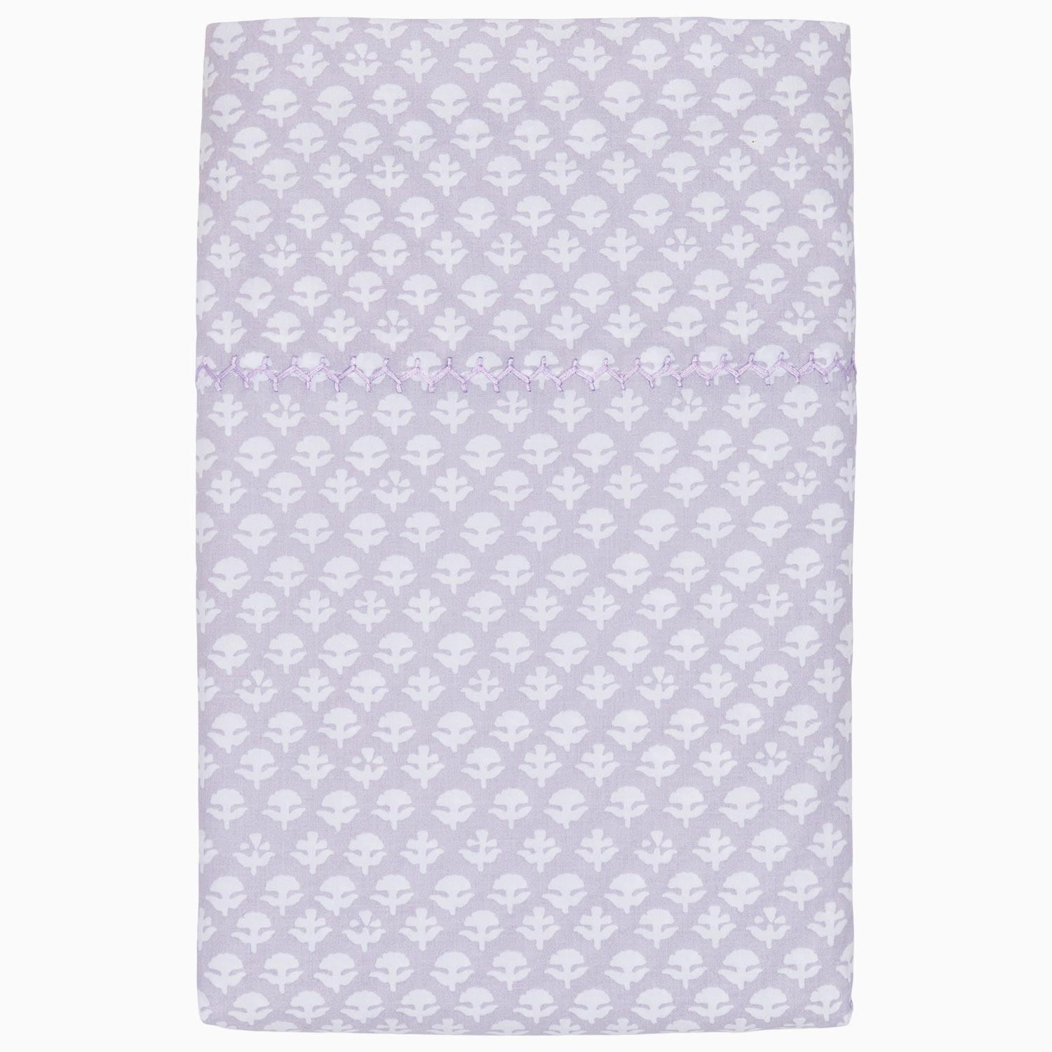 A John Robshaw Bindi Lavender Organic Sheet Set with a white pattern on it.