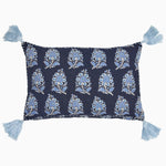 A blue Sofi Indigo Kidney Pillow with embroidered tassels and a hand block printed floral pattern by John Robshaw. - 30794791223342