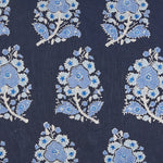 A Sofi Indigo Kidney Pillow by John Robshaw with hand block printed blue and white floral print on a navy blue fabric. - 30801476780078