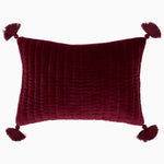 A Velvet Berry Kidney Pillow adorned with tassels. - 30404891672622