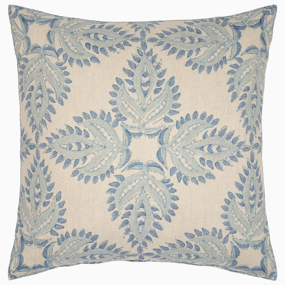 A Verdin Lapis decorative pillow by John Robshaw with a blue and white floral design.