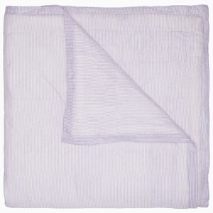 A Nandi Lavender Quilt, made by John Robshaw, on a white background, made of cotton.