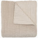 A soft, beige Velvet Sand Quilt by John Robshaw on a white background.