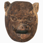 An intricately carved Piggy Mask from John Robshaw, against a pure white background. - 30498800205870