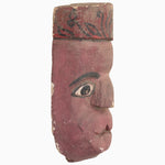 A Pink Fellow Mask with a red face on it, inspired by the masks of India, made by John Robshaw. - 30497669578798
