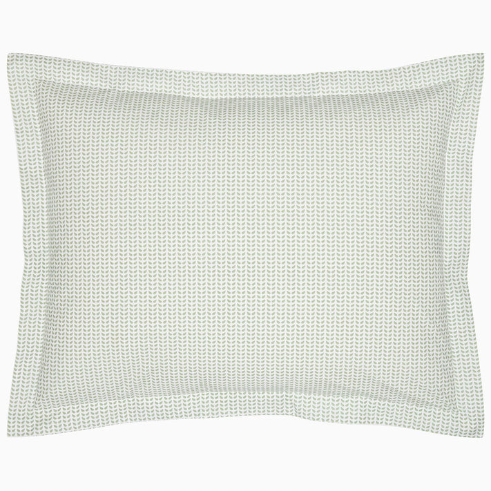 A John Robshaw Cinde Sage Organic Duvet with a green polka dot pillowcase on a white background.