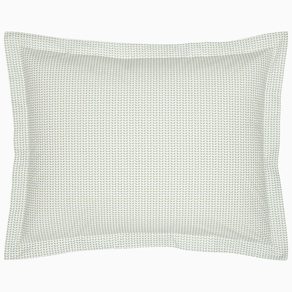 A John Robshaw Cinde Sage Organic Duvet with a green polka dot pillowcase on a white background.