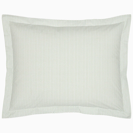 A John Robshaw Cinde Sage Organic Duvet with a green polka dot pillowcase on a white background.
