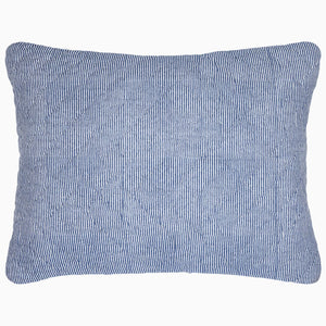 A Nandi Indigo Quilt pillow with simple stripes by John Robshaw.