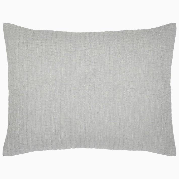 A Vivada Light Gray Woven Quilt with a cotton chambray coverlet on a white background. (Brand Name: John Robshaw)