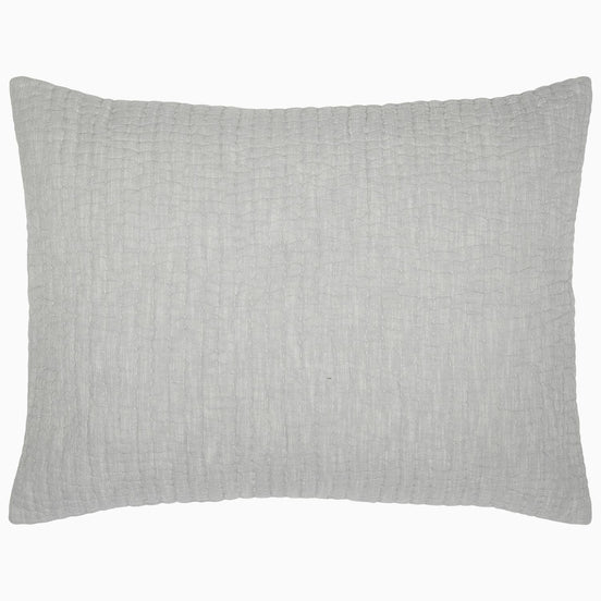 A Vivada Light Gray Woven Quilt with a cotton chambray coverlet on a white background. (Brand Name: John Robshaw)