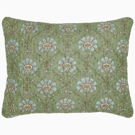 The Jeeva Sage Quilt by John Robshaw is a rectangular pillow with a green background, featuring a pattern of large blue and white flowers with intricate stems and leaves, reminiscent of a spring meadow design. This soft cotton quilted piece is both charming and cozy.