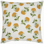 The Farah Marigold Decorative Pillow by John Robshaw showcases a square cotton linen design with a white background adorned with yellow floral patterns and green leaves, finished with hand-stitched edging. - 31272474509358