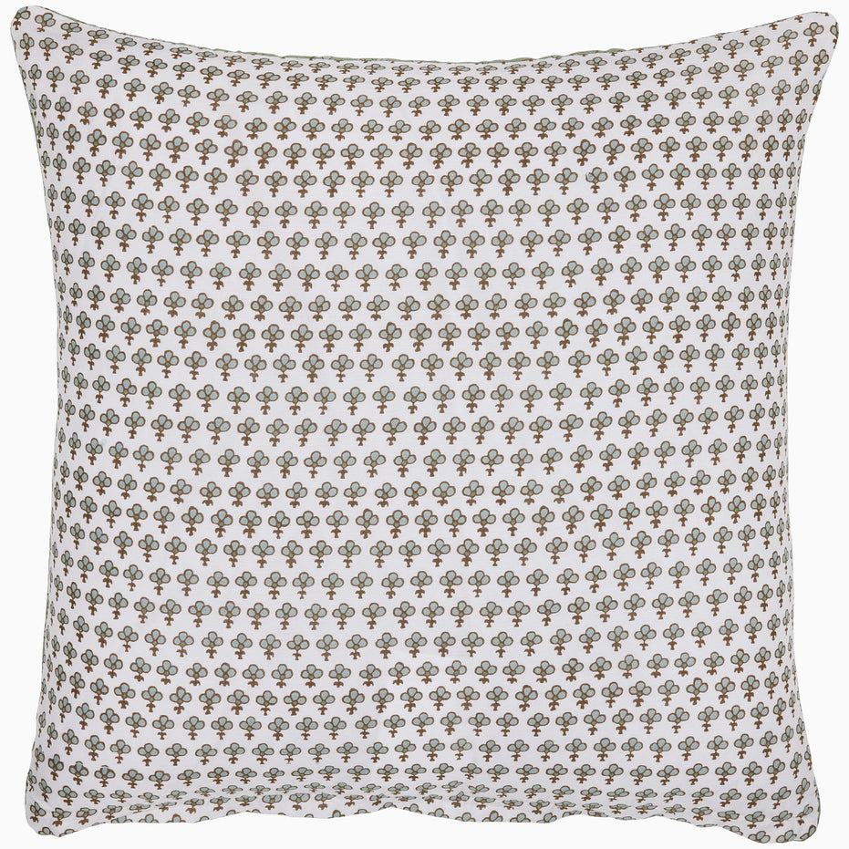 Square pillow from the Jeeva Sage Quilt collection by John Robshaw features a white background adorned with a spring meadow design of evenly distributed small, brown, and grey floral motifs.