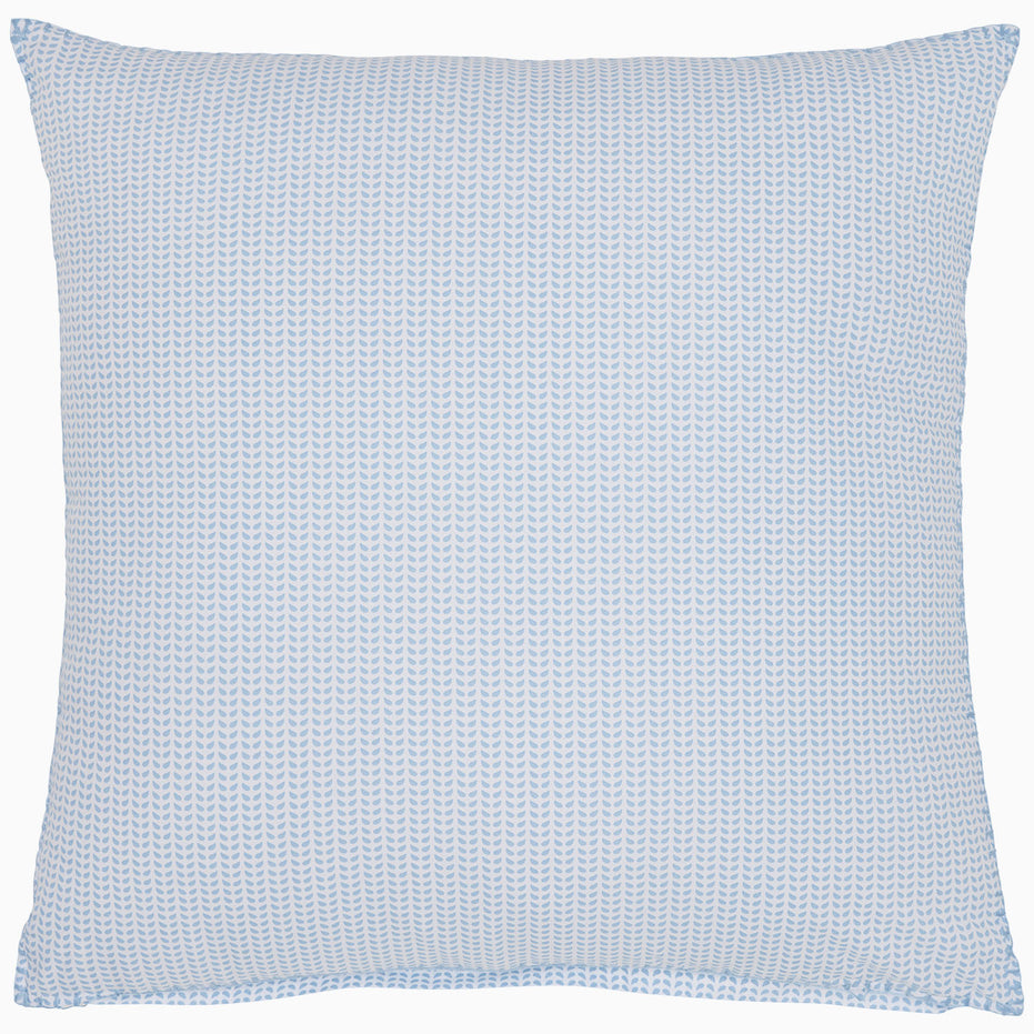 Square pillow featuring a light blue and white textured pattern, part of the John Robshaw Cinde Light Indigo Organic Duvet collection.