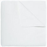 An Organic Hand Stitched White Quilt by John Robshaw folded on top of a white surface. - 28007112835118