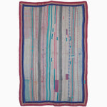 A handmade Barely Here cotton rug from India with colorful stripes on it. (Brand: John Robshaw) - 30235576827950