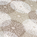 A close up of a beige and white flower pattern on John Robshaw's Chand Clay Daybed. - 29049990479918