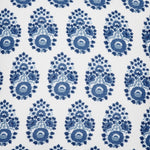 A blue and white floral pattern on a white background featuring small Adira Indigo Outdoor Decorative Pillows from John Robshaw. - 29302648602670