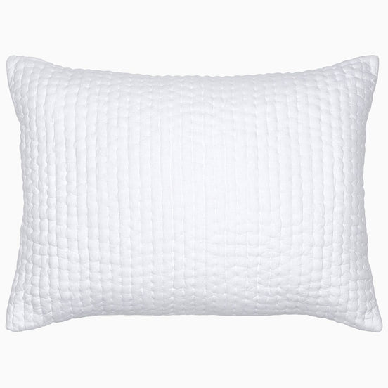 A Vivada White Woven Quilt pillow with hand stitching on a white background by John Robshaw.