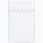 A white bed sheet with John Robshaw's Stitched Sand Organic Sheets and a gold trim. - 29299685130286