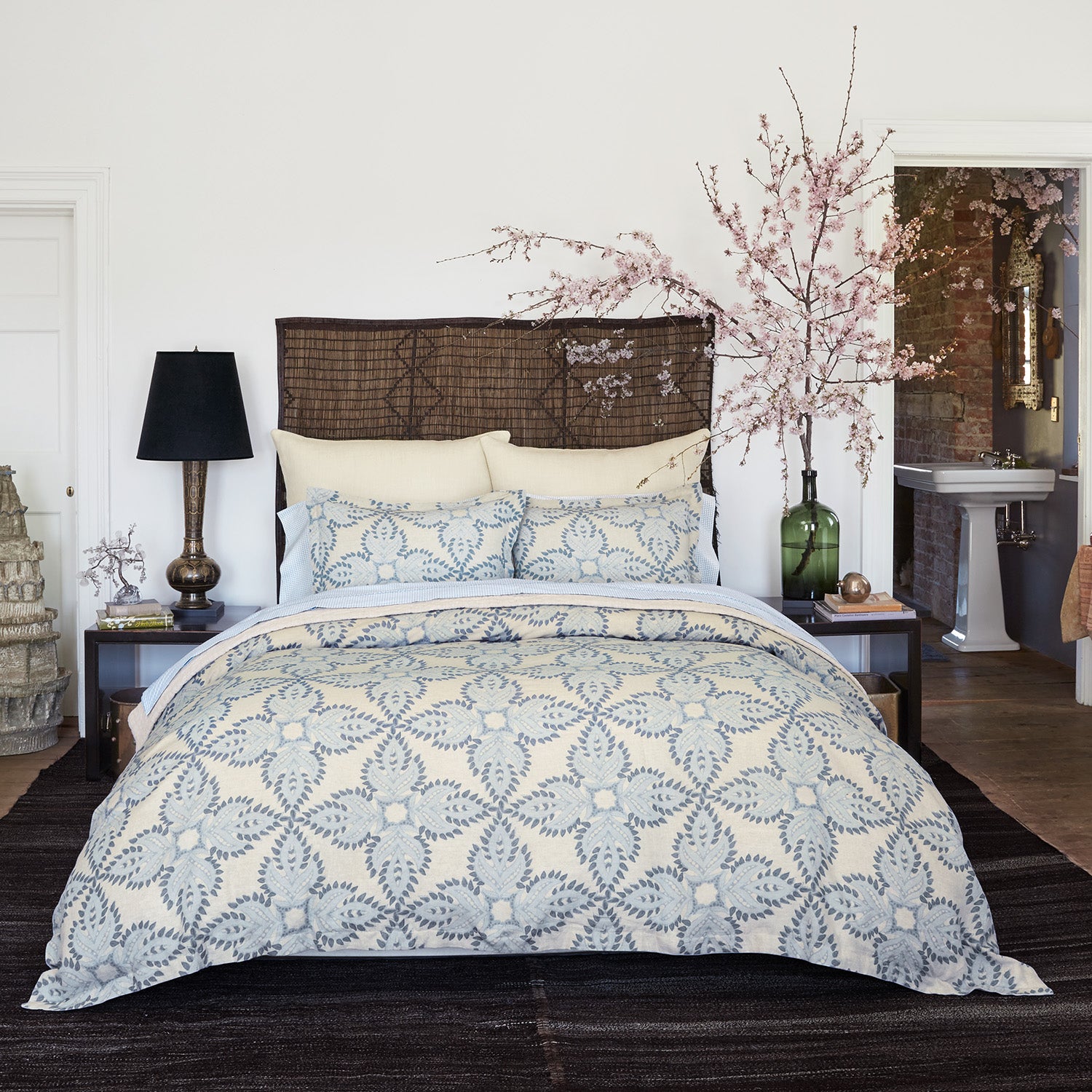 A Dasati Duvet Set by John Robshaw with a blue and white floral pattern made of cotton.