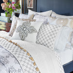 A John Robshaw Kajal Gray Organic Duvet cover with a blue and white comforter and pillows, featuring a 200 thread count. - 30002972393518