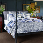 A hand-stitched four poster bed in a bedroom with John Robshaw's Ojas Indigo Decorative Pillows. - 30009702219822