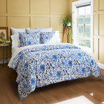 A Zoya Azure Organic Duvet, made with organic cotton, in a bedroom. - 30042841350190