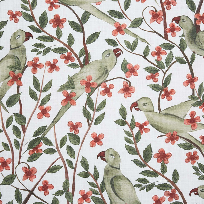 Handmade Suka Moss Fabric print of green parrots on a branch with red flowers by John Robshaw.