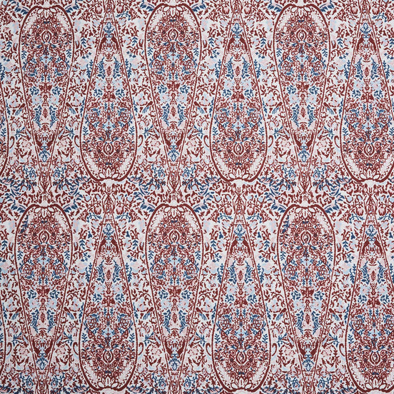 A John Robshaw Ishya Teak Fabric with a red and blue paisley print.