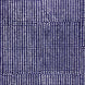 an Aleppo Indigo Wallpaper by John Robshaw with a blue and white pattern