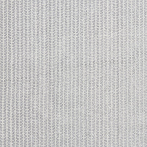 A close up image of a hand block printed John Robshaw Aleppo Silver Fabric skillfully created by artisans.