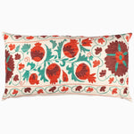 A decorative Red Suzani Www pillow with pomegranate flowers, inspired by embroidered tribal textiles from Central Asia, by Vintage Pillows. - 29543168376878