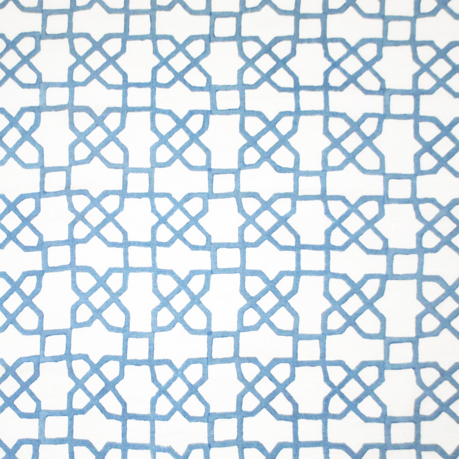 A blue and white pattern adorned with Mughal motifs on a white background, expertly crafted using traditional techniques of hand block printing, featuring the Citadel Light Indigo Fabric by John Robshaw.