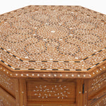 An octagon shaped wooden table with a Natural Bone Inlay Table design on it from the Furniture brand. - 29553992695854