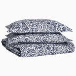 A stack of Ira Indigo Organic Duvet pillows by Duvets & Shams on top of each other. - 29980989521966