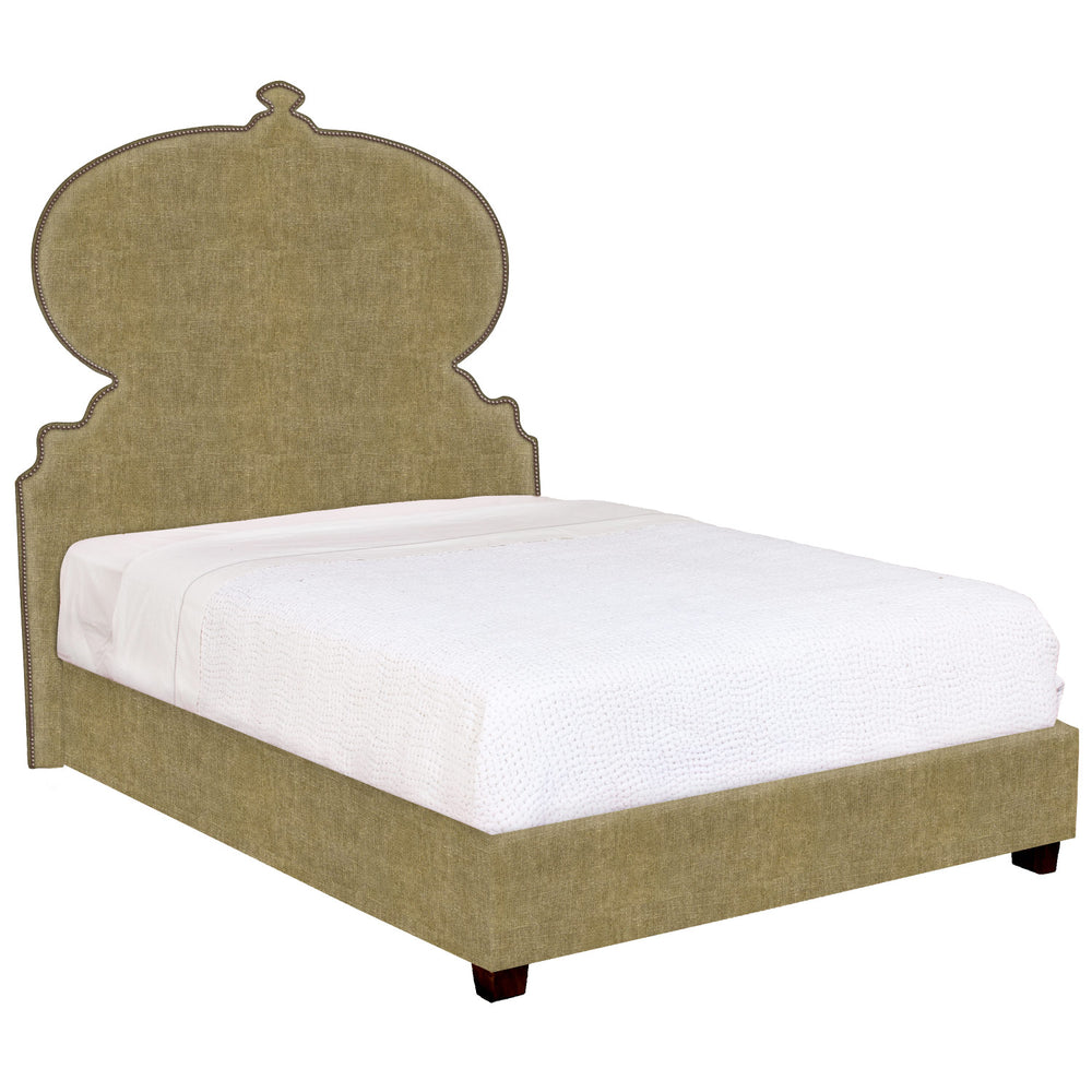 A John Robshaw bed with an ornate headboard and footboard that offers white glove delivery.
