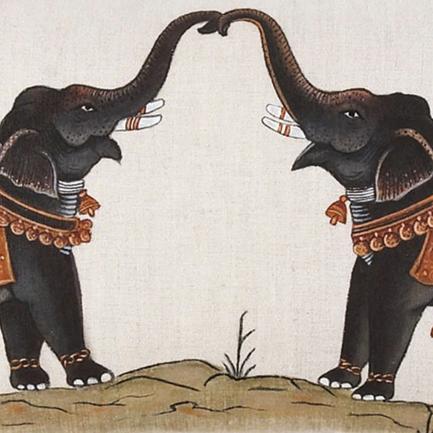 A John Robshaw Two Elephants Decorative Pillow of two elephants holding hands.