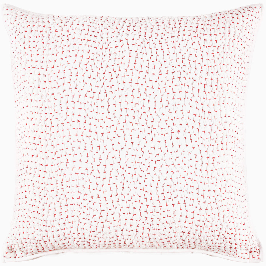 A pink and white Organic Hand Stitched Lotus Quilt with John Robshaw organic cotton cover and hand stitching.