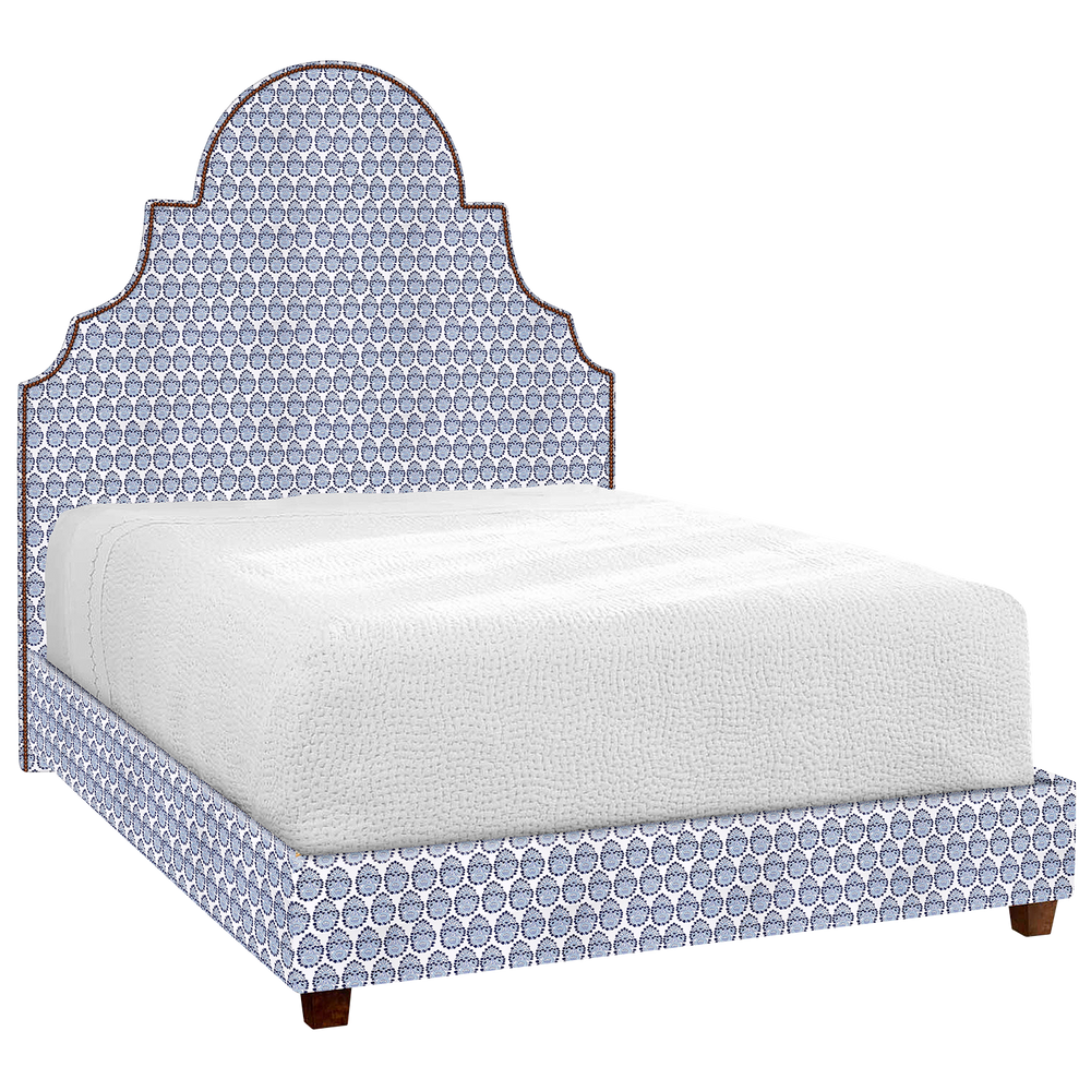 A Custom Dara Bed by John Robshaw with a blue patterned headboard and footboard, available for shipping.