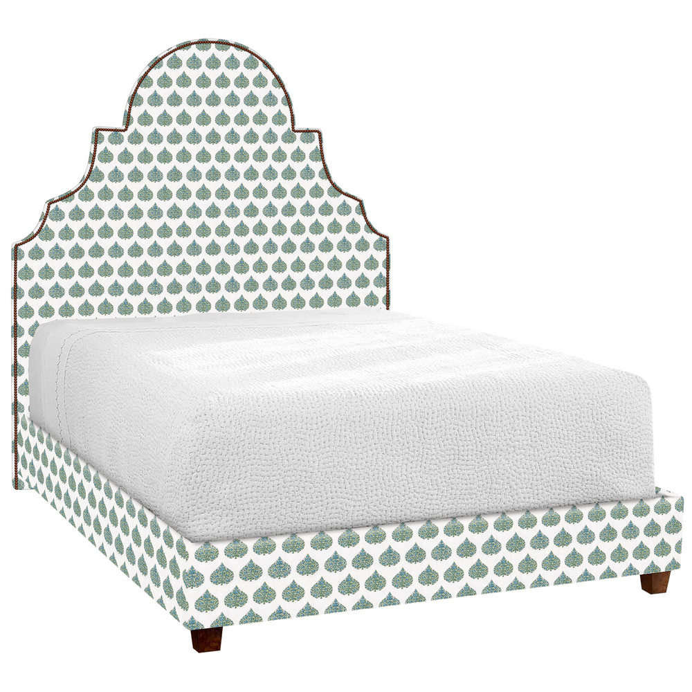 A Custom Dara Bed by John Robshaw with a green and white polka dot pattern for shipping.