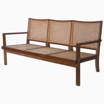 A Wooden and Cane Sofa - 3 Seat with a rattan seat, by John Robshaw. - 29225101262894