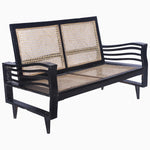 A Vintage Furniture black loveseat with restored rattan cane work on the seat. - 29225305505838