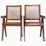 A pair of Jeanneret chairs with cane backs. - 29225396731950