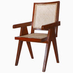 A Jeanneret Chair by John Robshaw with a rattan seat. - 29225396699182
