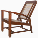 A Vintage Furniture Chair With Slanted Back lounge chair with a rattan seat. - 29225408659502